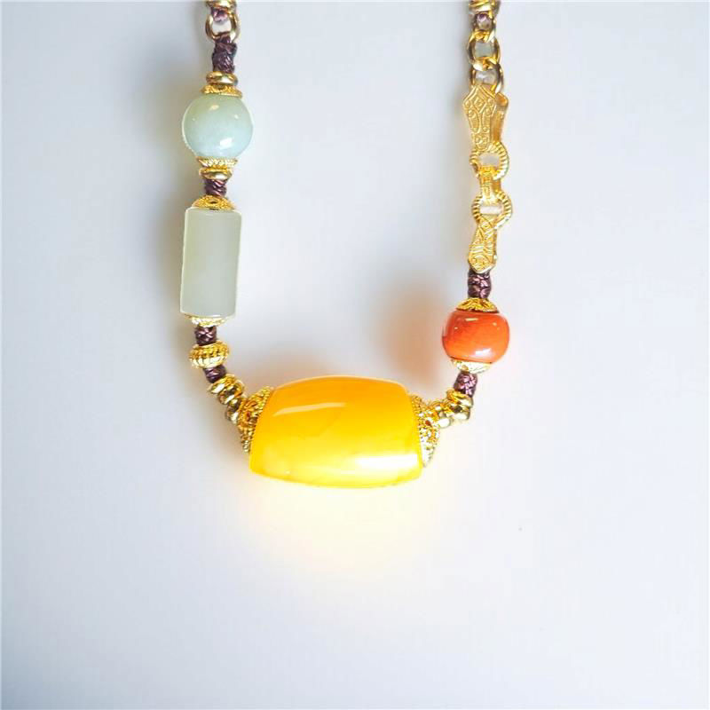 琥珀蜜蜡多宝水晶吊坠 (12mm)