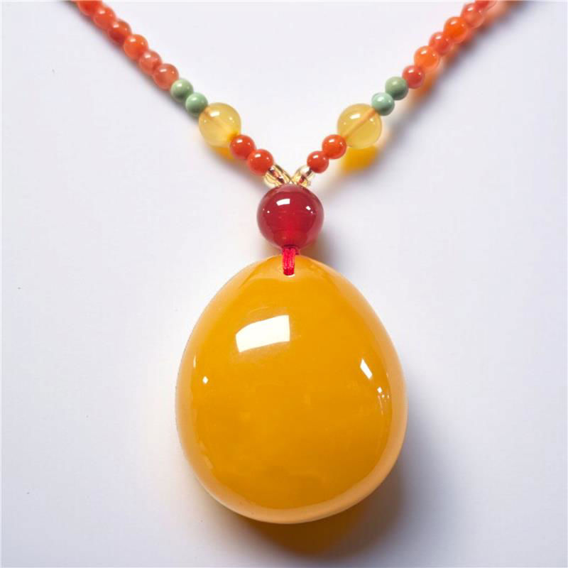 琥珀蜜蜡 (水滴形) 南红玛瑙吊坠 (32mm)
