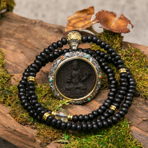 Gold and 2025 silver pendant